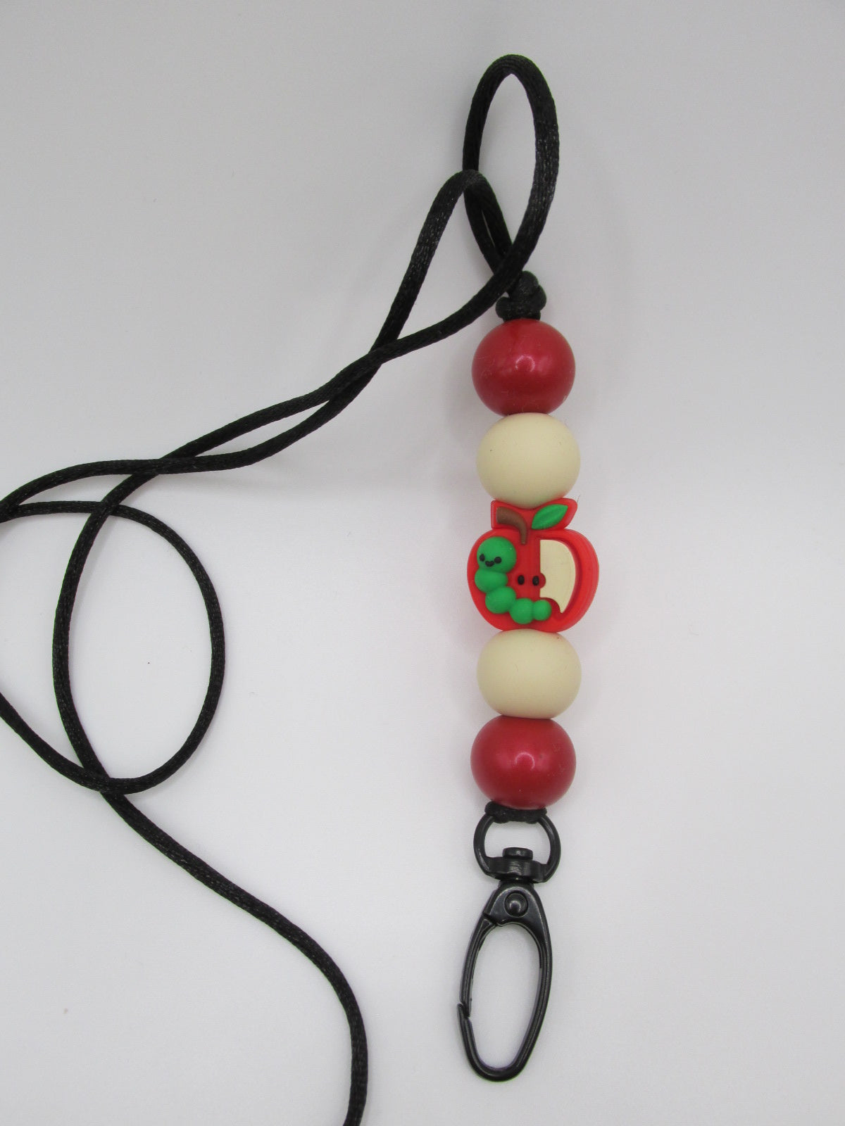 Apple and worm lanyard
