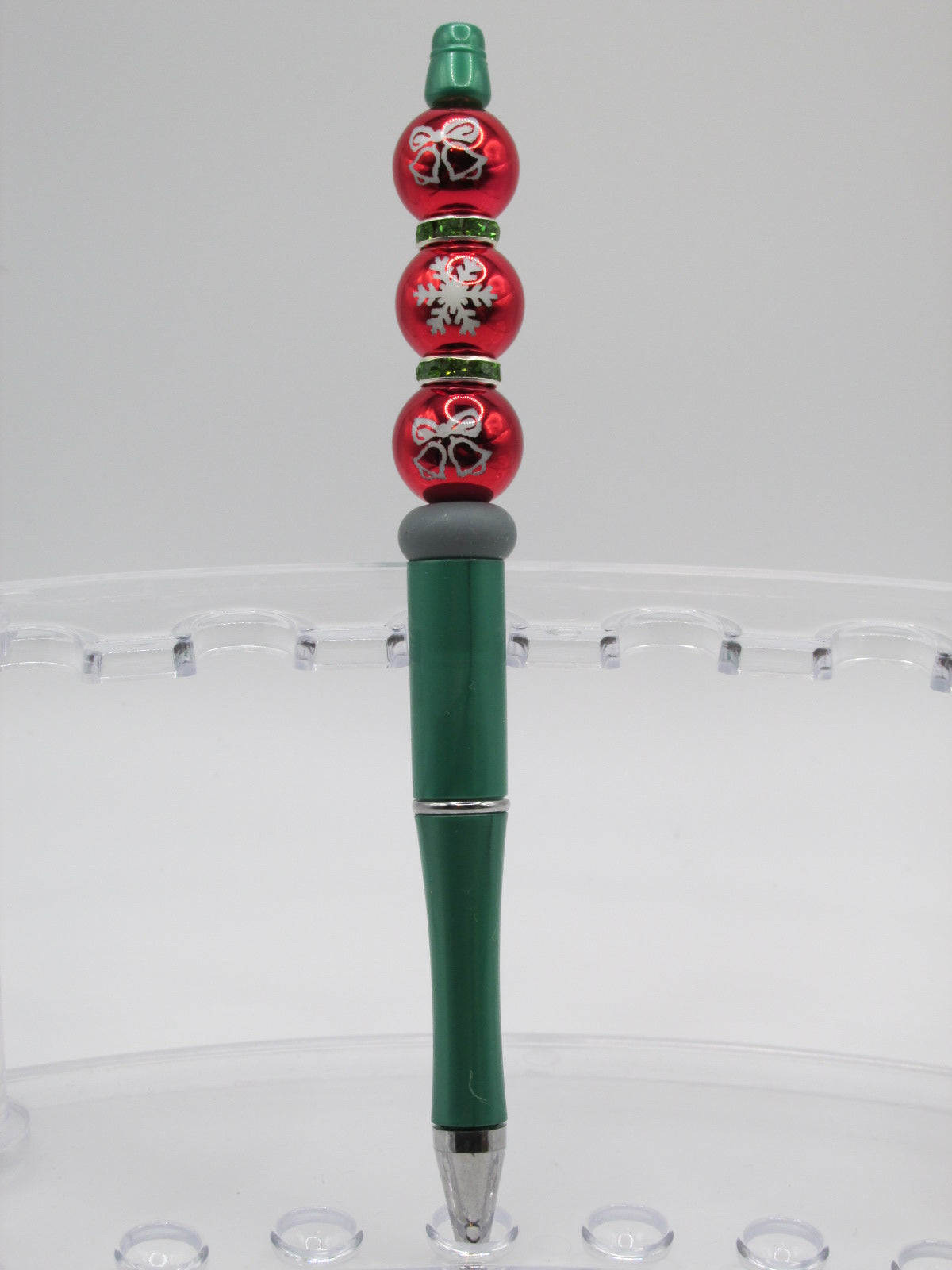 Red acrylic with snowflakes and bells