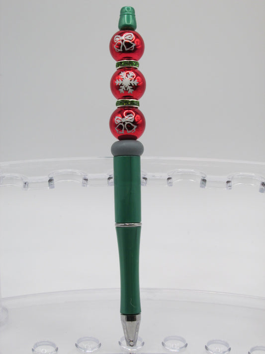 Red acrylic with snowflakes and bells
